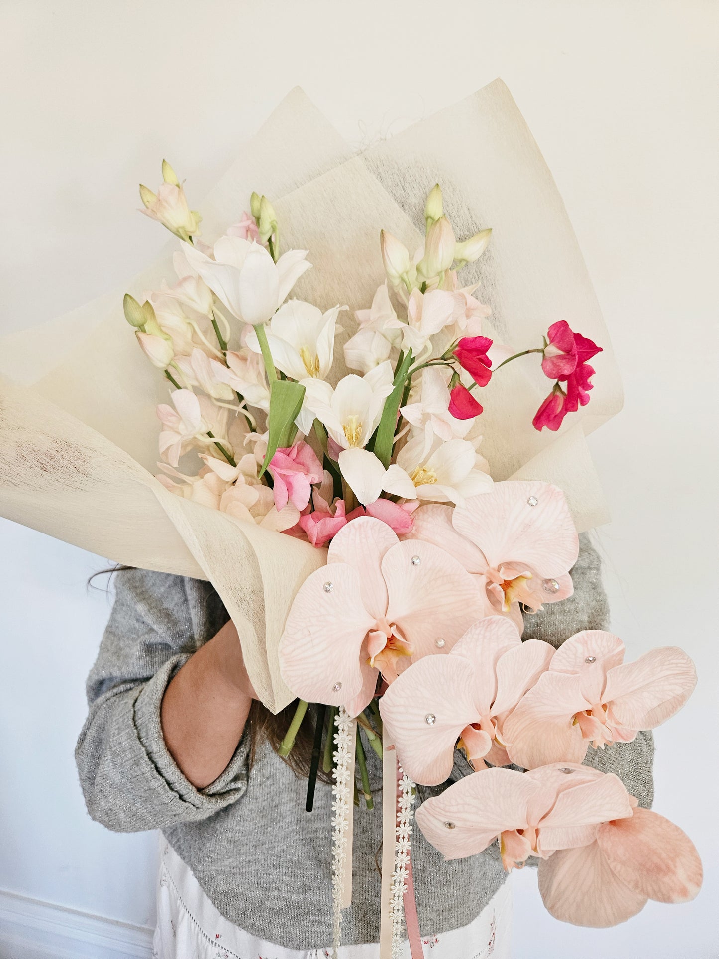 The Taylor - Vivid orchids and sweetpeas adorned with shimmering gemstones